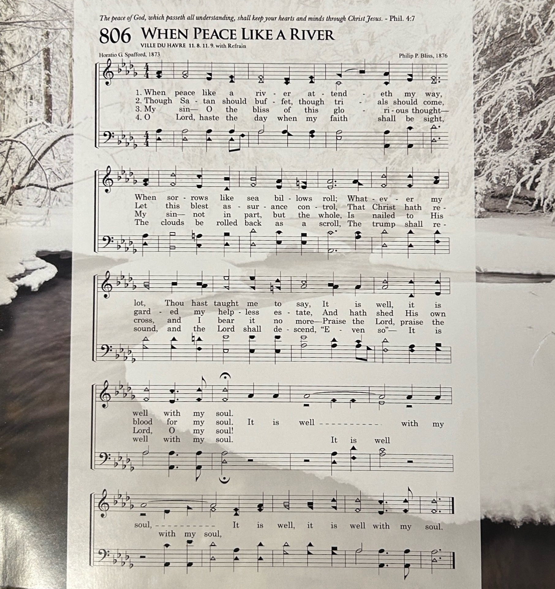 The score for When Peace Like a River over a photograph of a snowy stream.