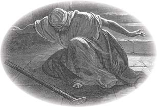 A man kneeling low to the ground