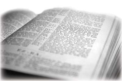 Open Bible photographed from a low angle