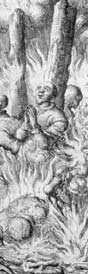 A man bound to a stake surrounded by flames