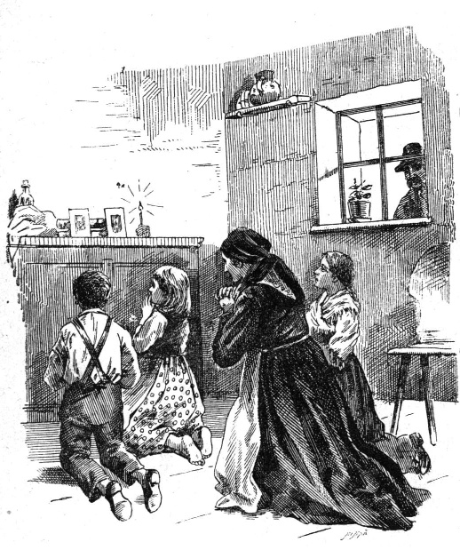 A mother and children kneel together in prayer