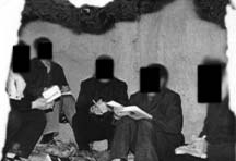 People seated together with books, their faces obscured in the source photograph