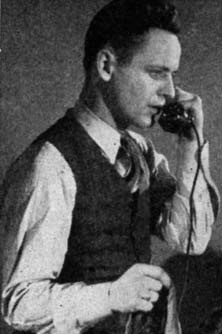 Man speaking on a telephone